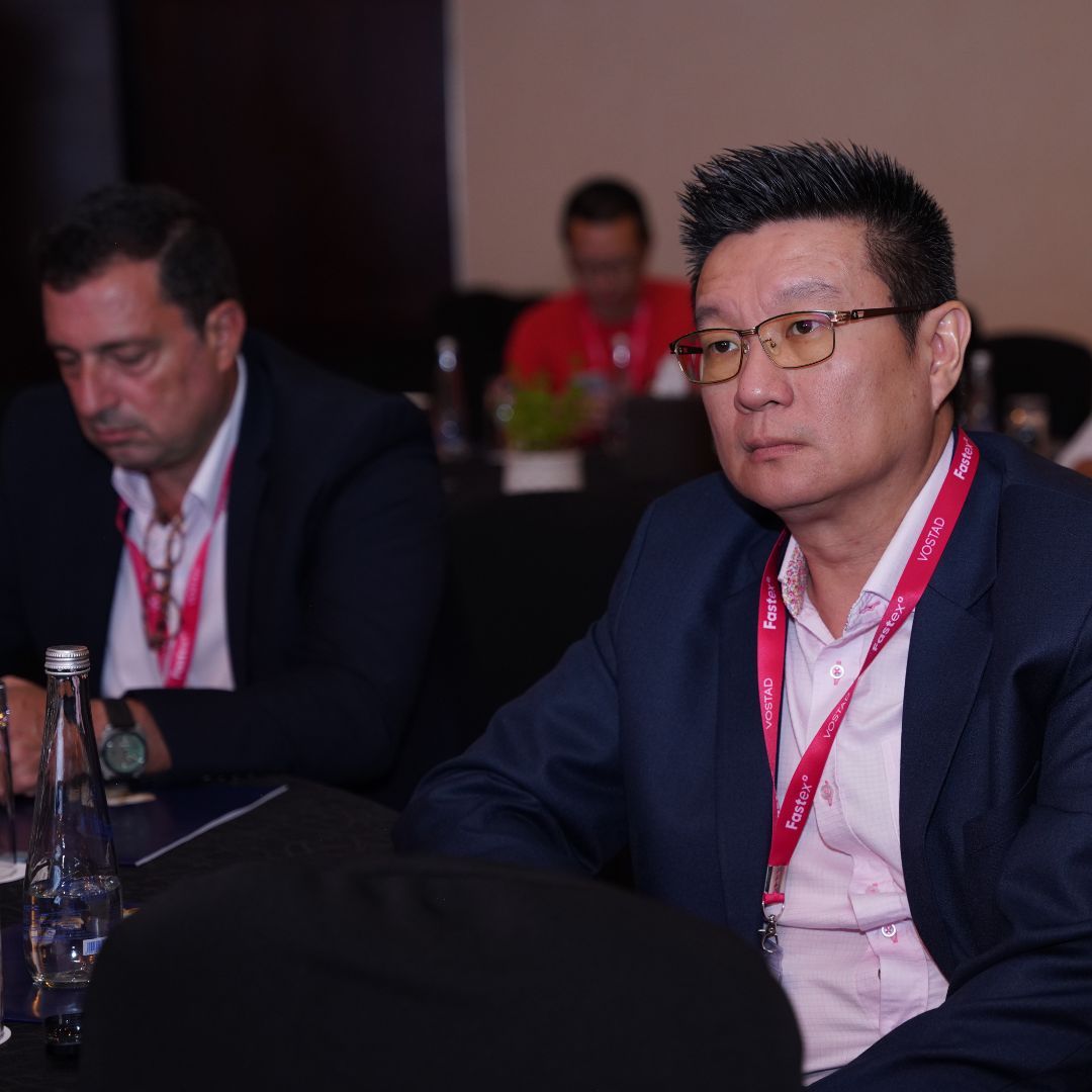 An executive listens intently during a closed session.